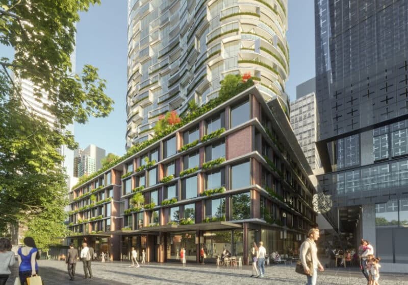 An artist's rendering of a building with a green roof.