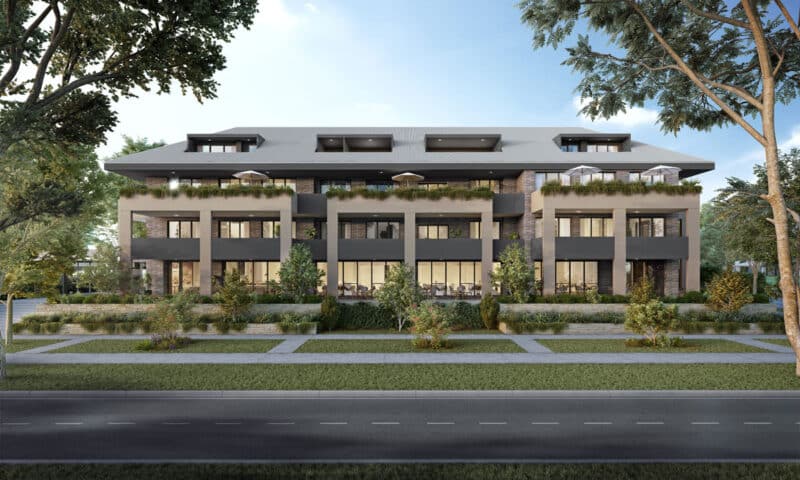 A building with trees and grass.