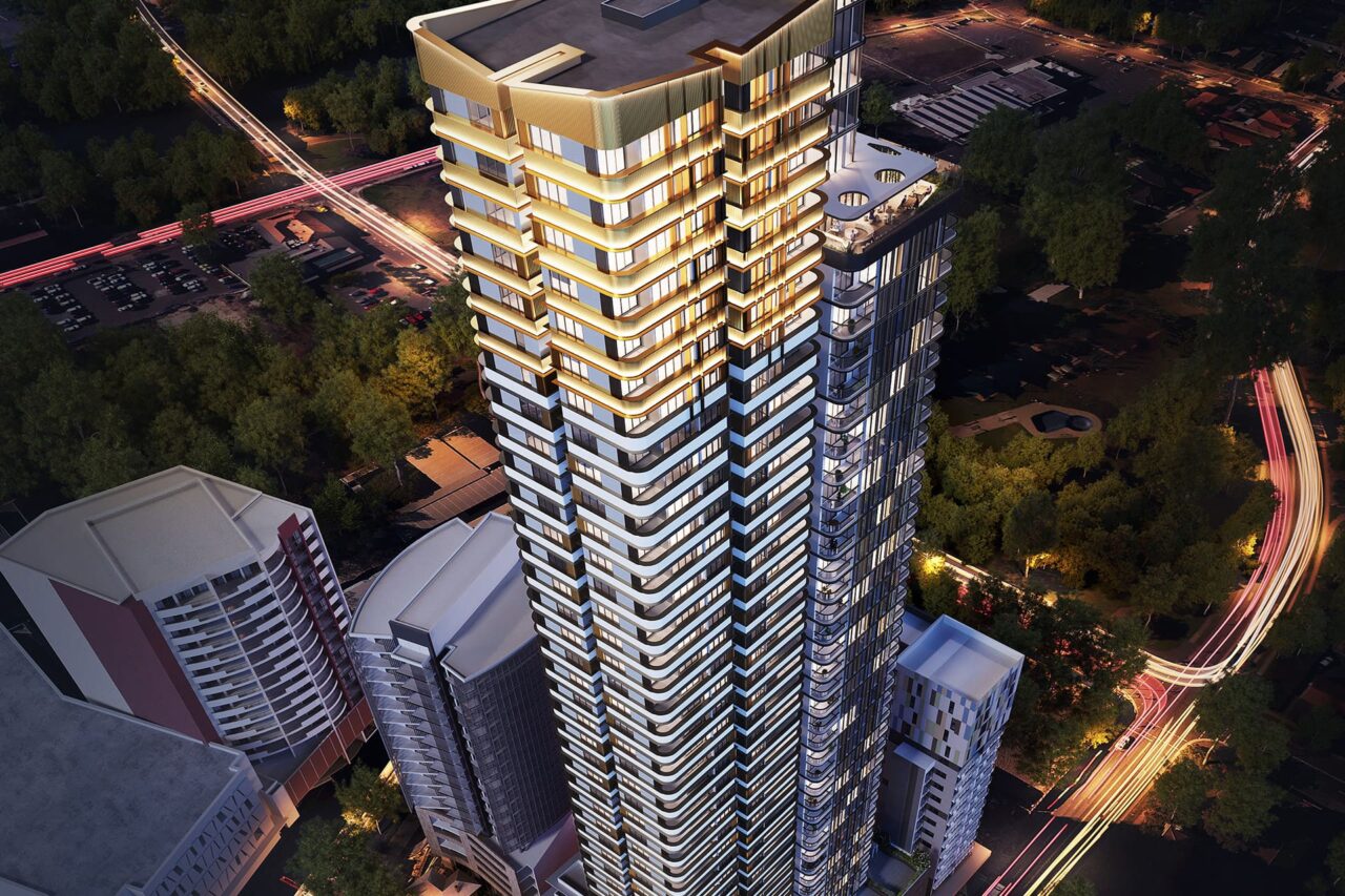 An aerial view of a tall building at night.